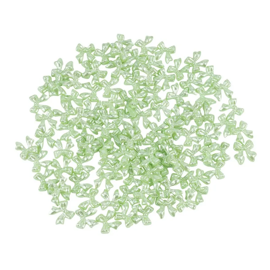 Miniatur-Schmuckstein-Schleifen, perlmutt, 0,9cm x 1cm x 0,2cm, pastell-grün, 100 Stück