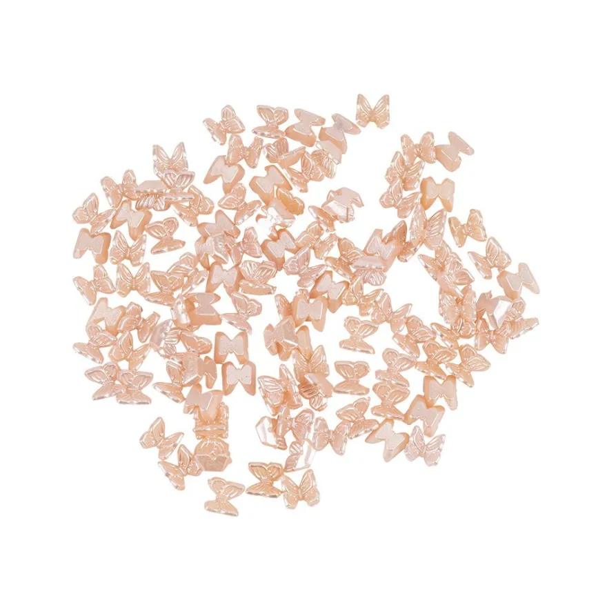 Miniatur-Schmuckstein-Schmetterlinge, perlmutt, 0,6cm x 0,6cm x 0,3cm, pastell-apricot, 100 Stück