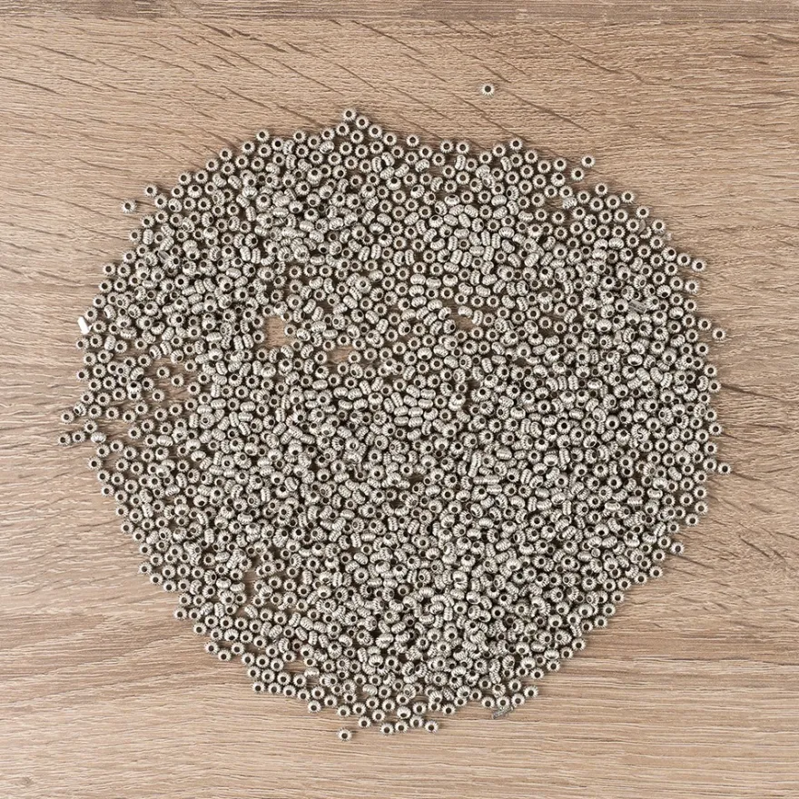 Perlen, Rondell, geriffelt, 0,4cm x 0,3cm, silber, 1880 Stück