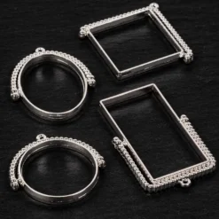 Rahmen-Anhänger, rotierend, verschiedene Designs, silber, 4 Stück