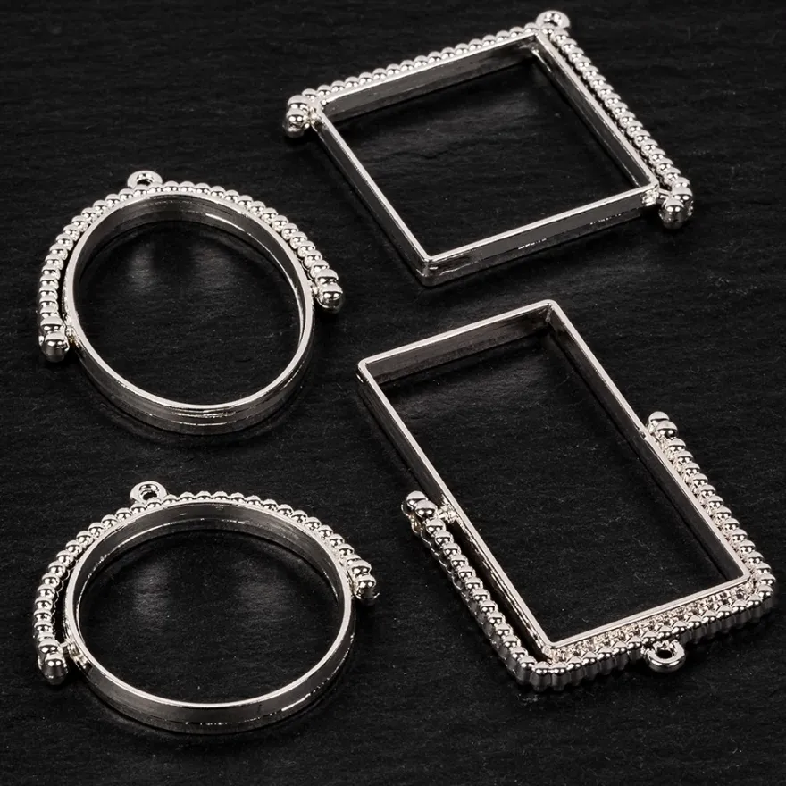 Rahmen-Anhänger, rotierend, verschiedene Designs, silber, 4 Stück